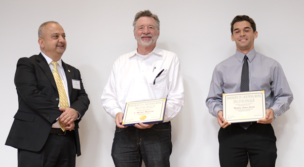 McCarthy (center) and Cecchi (right) are congratulated by UROP Director Said Shokair after the awards ceremony.