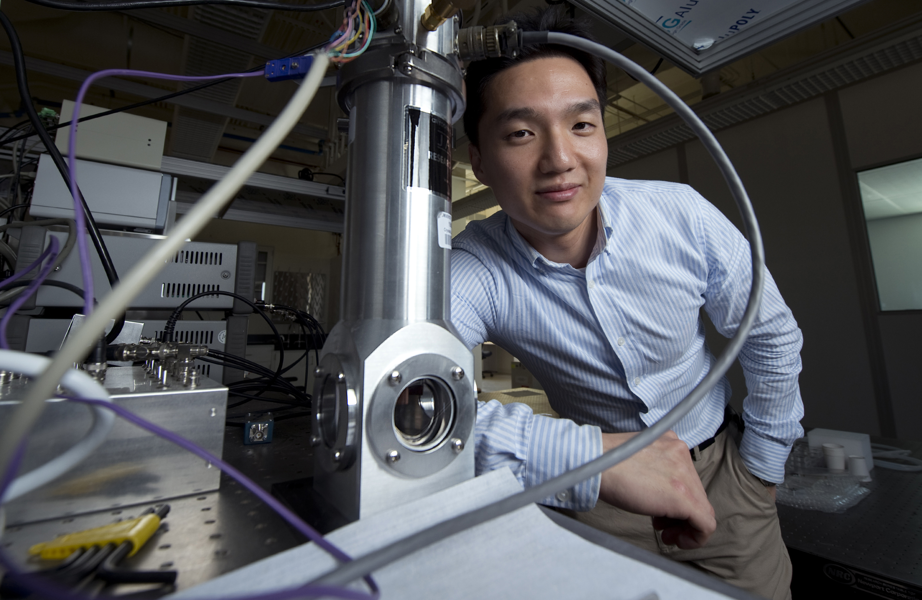 Jaeho Lee, UCI assistant professor of mechanical & aerospace engineering, believes that holey silicon – microchip material vertically etched with nanoscale orifices – might be a breakthrough in the quest to keep modern electronics cool. Steve Zylius / UCI