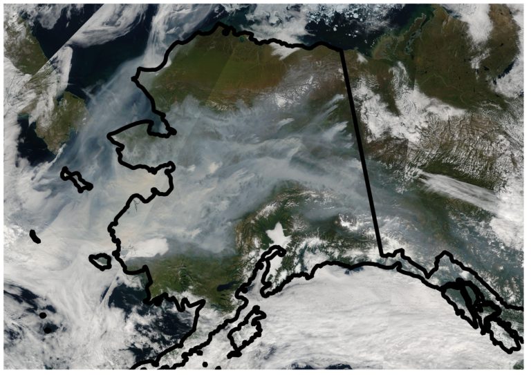 A satellite image of Alaska captured in August 2005 shows the extent of smoke coverage from wildfires in the state’s boreal forests. The blazes are likely to become large in exceptionally hot and dry conditions and when there’s a high percentage of black spruce trees in the affected areas – key factors in a new predictive model developed by UCI scientists. NASA