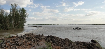 A boat crew from the U.S. Geological Survey measures the effects of levee detonations, meant to ease flood risk along the Mississippi River in 2011. Photo courtesy of USGS