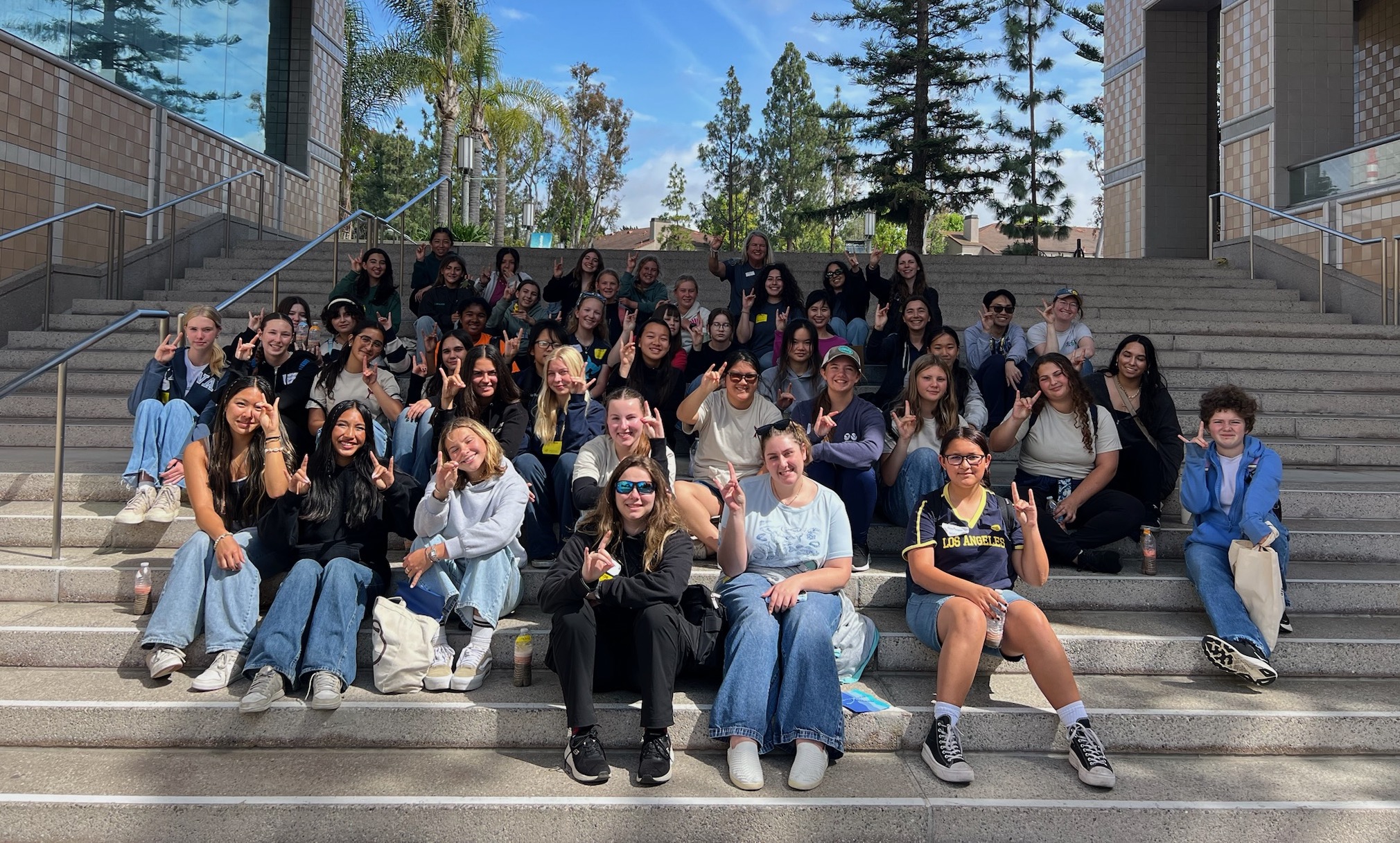 Ocean Institute's cohort of students, UCI graduate students Jianlei Wen and Kathryn Jones, OAI Executive Director Analia Rao, and Professor Mo Li at UCI’s Engineering Gateway.