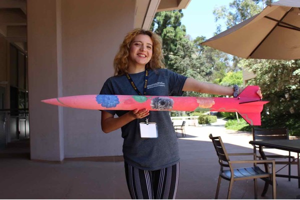 Maria Corona of Orange Coast College poses with her personalized rocket.