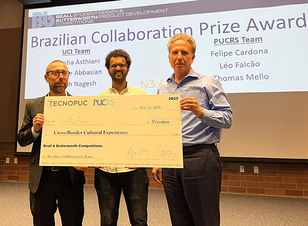 Pictured from left, Dean Magnus Egerstedt, N3.AI team member Nitish Nagesh and Dean Marios Papaefthymiou. Photo courtesy of Brian Dao.