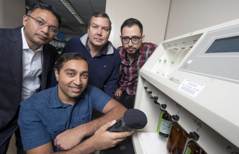 UCI researchers who helped discover that hackers can steal genetic blueprints by interpreting the sounds emitted by a DNA synthesizer are (from left) Mohammad Al Faruque, associate professor of electrical engineering & computer science; Arnav Malawade, a graduate student in Al Faruque’s lab; John Chaput, professor of pharmaceutical sciences; and Sina Faezi, also a graduate student in Al Faruque’s lab. Steven Zylius / UCI