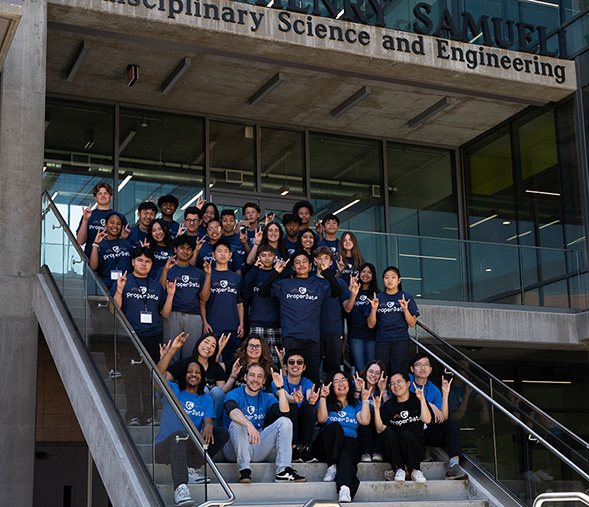 ProperData summer program participants and teaching team Zot in front of UCI’s Interdisciplinary Science and Engineering Building.