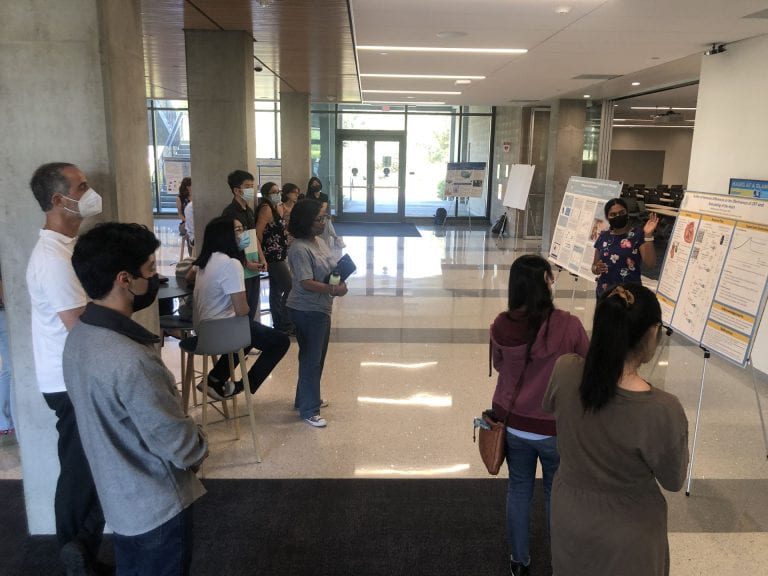 Undergraduate students in the Samueli Interdisciplinary Research in Pods program gather in the lobby of UCI’s Interdisciplinary Science and Engineering Building for a poster session to discuss their summer research projects. Brett Sanders / UCI
