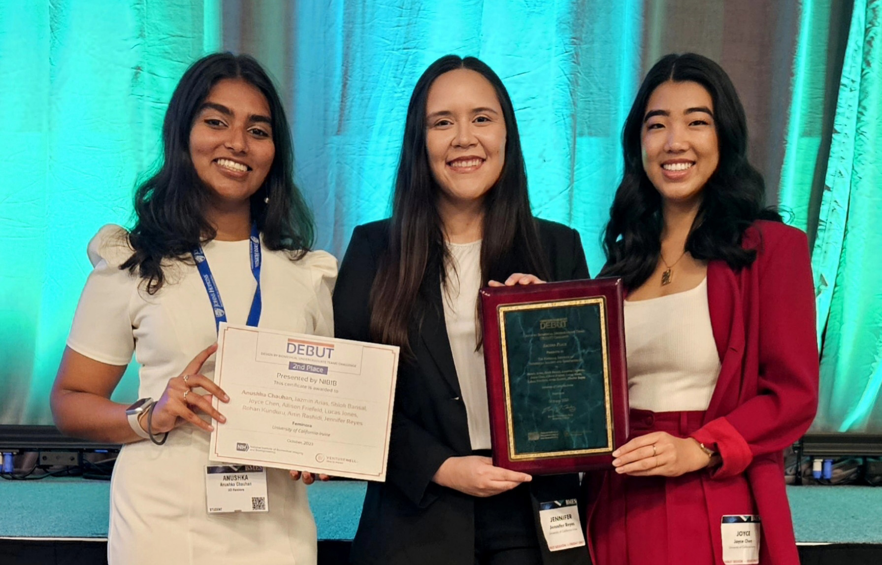 From left: Anushka Chauhan, Jennifer Reyes, and Joyce Chen with their award at the National Institute of Health DEBUT Challenge