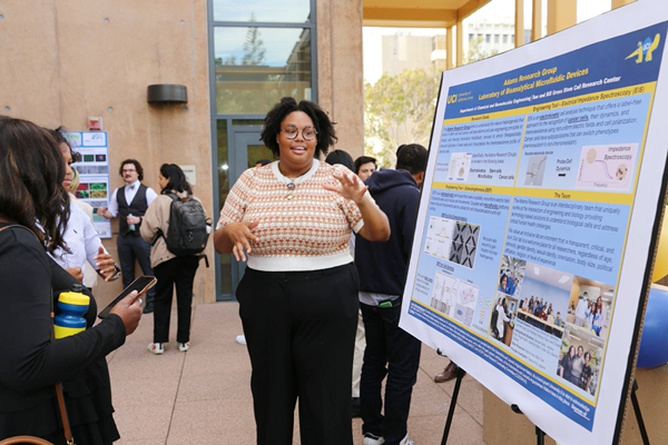 Chemical and biomolecular engineering graduate student Kiara Lacy presents research from the Adams lab. 