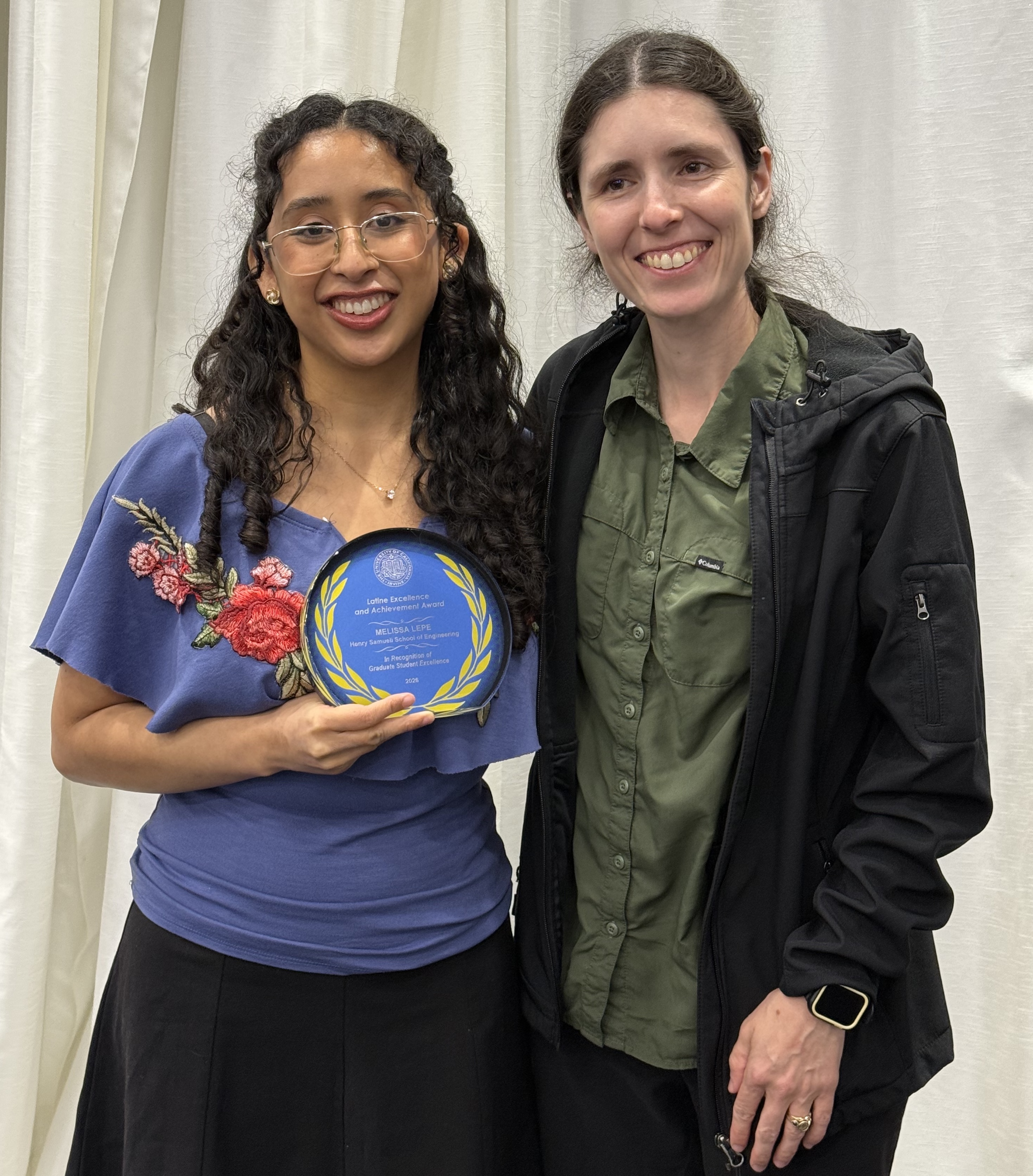 Melissa Lepe (left) with her adviser Jacqueline Huynh at the 2026 Latine Excellence and Achievement Dinner.