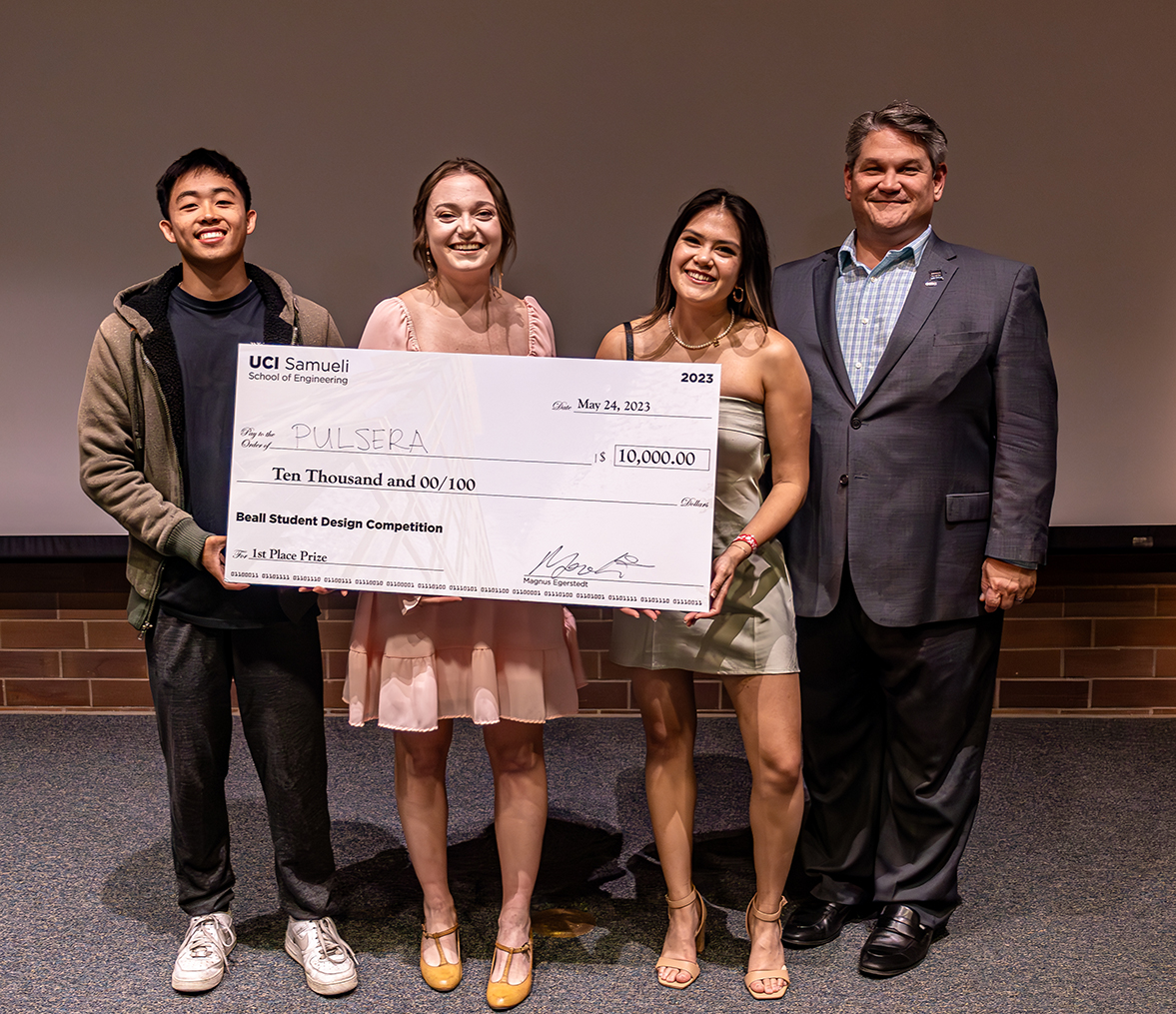 Pictured, from left, are biomedical engineering students who won first place for their product Pulsera: Ryan Hsu, Claire Livengood and Nicolette Fulcomer with David Ochi, board member of the Beall Center for Innovation and Entrepreneurship. Photo courtesy of Anthony Herrera Zarate.