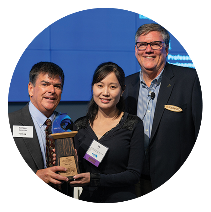 Li with Enrique Lavernia, UCI provost and executive vice chancellor, and Richard Sudek, UCI chief innovation officer and executive director of UCI Beall Applied Innovation, at the 2019 UCI Innovator of the Year Awards ceremony.