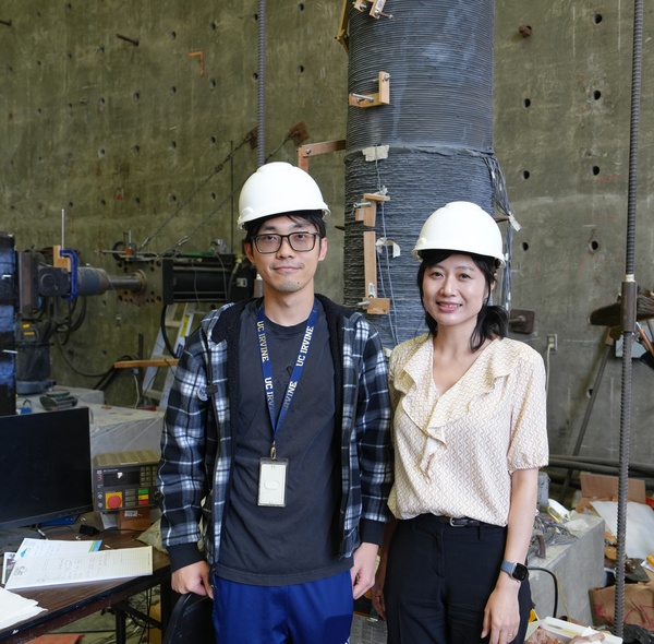 Civil engineering graduate student Jianlei Wen (left) and UCI Professor Mo Li in front of a large-scale reinforced concrete column 3D printed and tested under fatigue and seismic loading in UCI’s Structural Engineering and Testing Laboratory. 