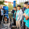 Boeing's Michael Kisska checks out the Baja race car. 