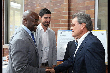 Dean Gregory Washington greets the guest of honor, former Catalonian president Artur Mas at the Balsells event