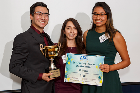 UCI civil engineering undergraduates Raul Rodriguez (left) and Darlyn Hernandez (right) flank engineer Gabreelle Gonzalez after winning the Outstanding Student Chapter award at the ASCE History and Heritage/Student Scholarship Night.
