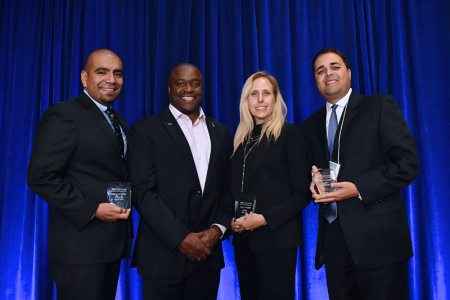 This year's Samueli School Hall of Fame inductees include, from left, Robert Sanchez, Cindy Miller and Hany Haroun (with Dean Gregory Washingon, second from left). Not pictured: Daryoosh Vakhshoori. Photo credit: Carlos Puma