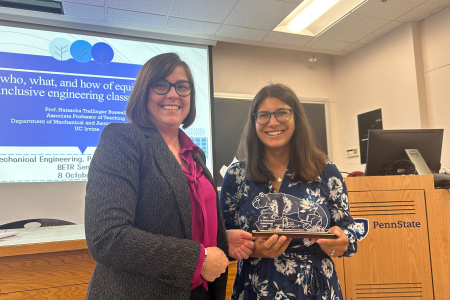 Natascha Buswell (right) accepts the Belonging Excellence and Transformative Research (BETR) Allyship Advocate Award from Pennsylvania State University’s Mechanical Engineering Department Chair Mary Frecker.