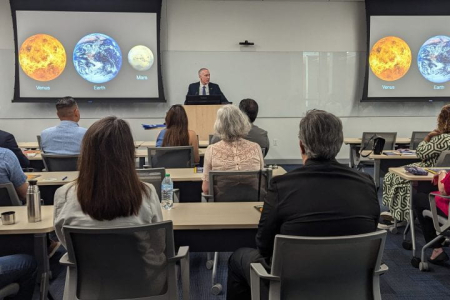 School of Physical Sciences Dean James Bullock addressed a group of nearly 40 business, community and government representatives who came to UC Irvine recently to learn about sustainable energy research happening on campus. Roopa Atluri / UC Irvine