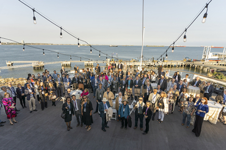 Guests and honorees gather on the Captain’s Deck for a cocktail reception at the 2024  Hall of Fame celebration on board the legendary Queen Mary in the Port of Long Beach. 