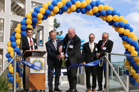 UCI Chancellor Howard Gillman and HORIBA Group Chairman and CEO of HORIBA Ltd. Atsushi Horiba cut a ribbon to formally open the HIMaC2 advanced mobility research center on the UCI campus. They are flanked by (on the left) HIMaC2 Director Vojislav Stamenkovic, UCI professor of chemical and biomolecular engineering; and (on the right) UCI Dean of Engineering Magnus Egerstedt and Jai Hakhu, executive corporate officer for HORIBA Ltd. Lori Brandt / UCI