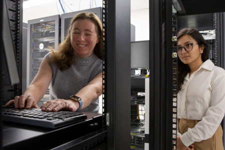 Arizona State University researcher Yulia Peet works with Anushka Subedi, a mechanical engineering doctoral student, in the university’s high-performance computing facilities. Peet leads a team of researchers from the University of California, Irvine and Brown University in a three-year, $2.25 million Air Force Office of Scientific Research project to study new uses of metamaterials for passive flow control in aerospace and defense applications. The project also seeks to develop a diverse workforce in the field. Photographer: Erika Gronek/ASU