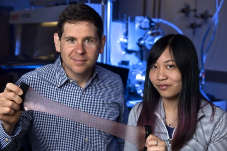 Alon Gorodetsky, UCI associate professor of chemical & biomolecular engineering, and Erica Leung, a UCI graduate student in that department, have invented a new material that can trap or release heat as desired. Steve Zylius / UCI
