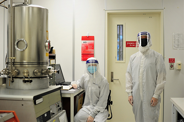 Former biomedical engineering doctoral student Sung Sik Chu (right) and former electrical engineering and computer science undergraduate student Daria Shkel (left, now a doctoral student at Cornell University) use an E-beam evaporation process inside INRF to deposit platinum to fabricate the microelectrodes. 