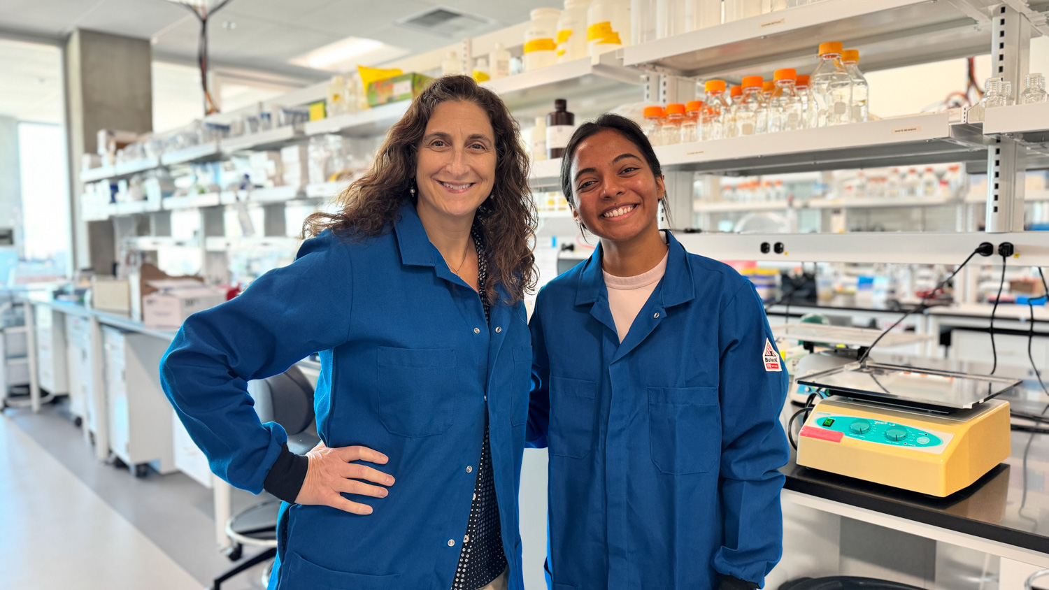 Two scientists standing in the lab